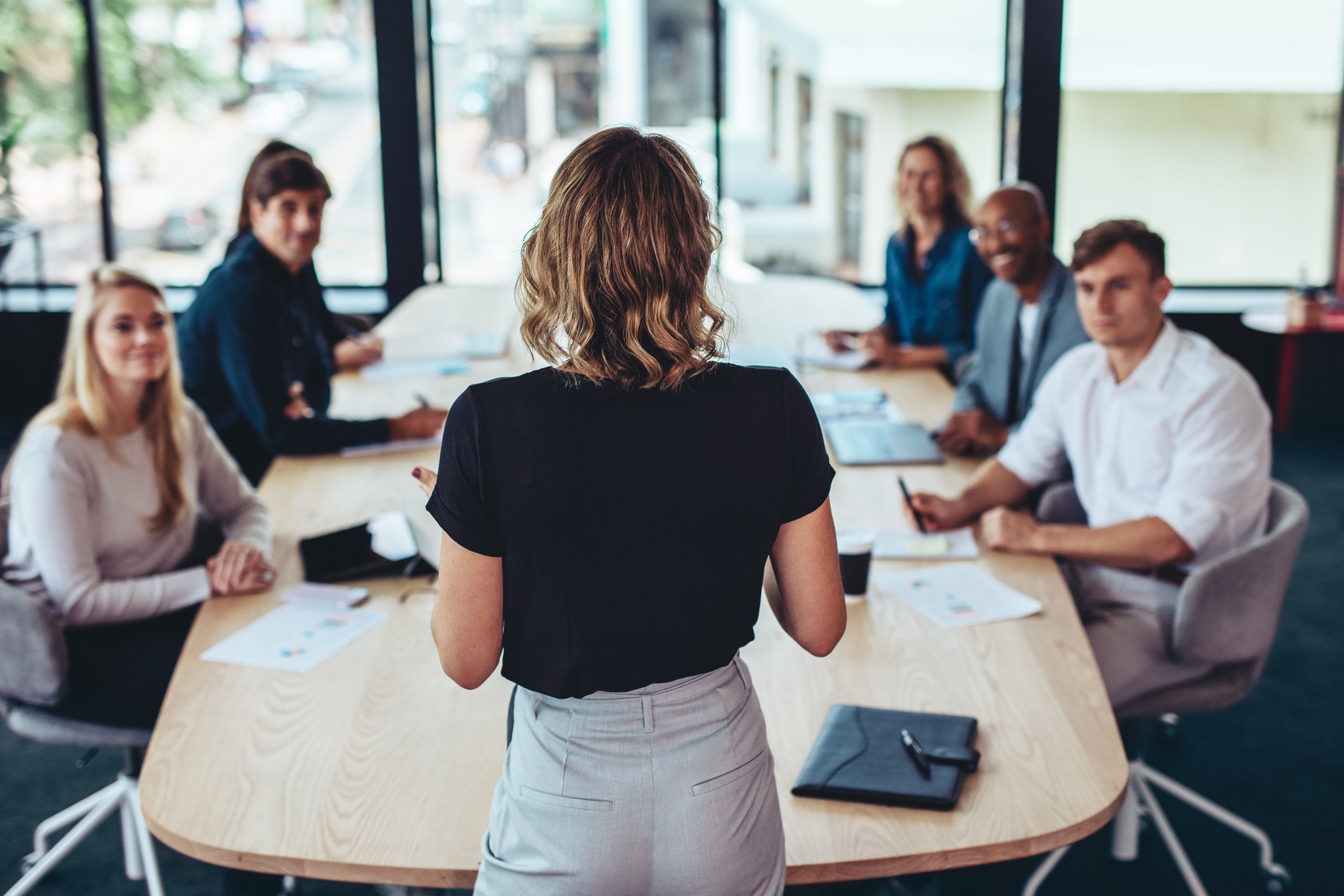 People sitting in a board room.