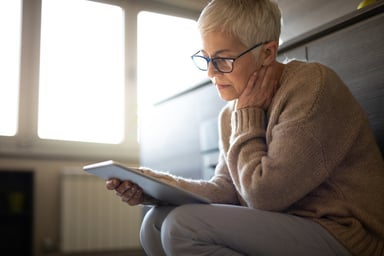 Senior woman holding tablet