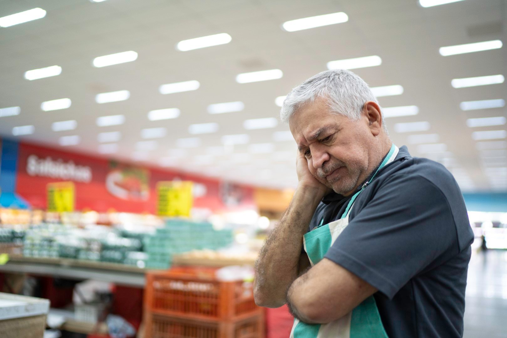 stressed retail worker sad