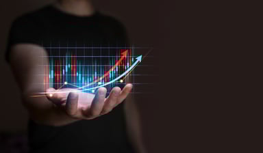 stock market arrows going up in hand