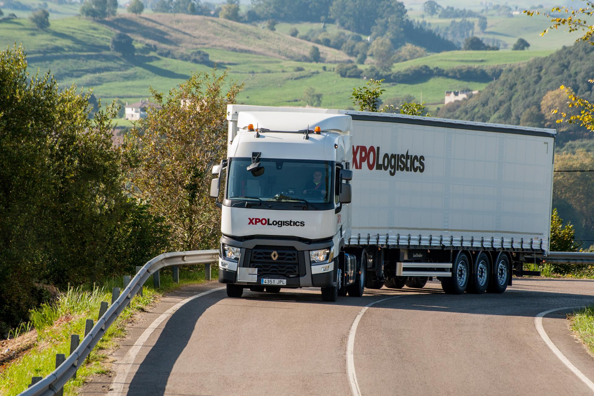 An XPO Logistics truck on the road.