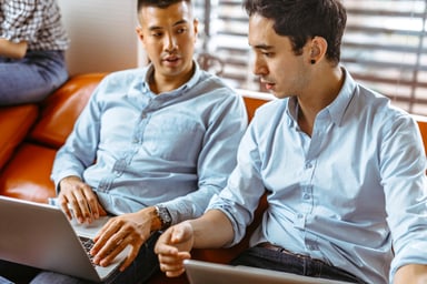 work together sitting laptop teach learn 