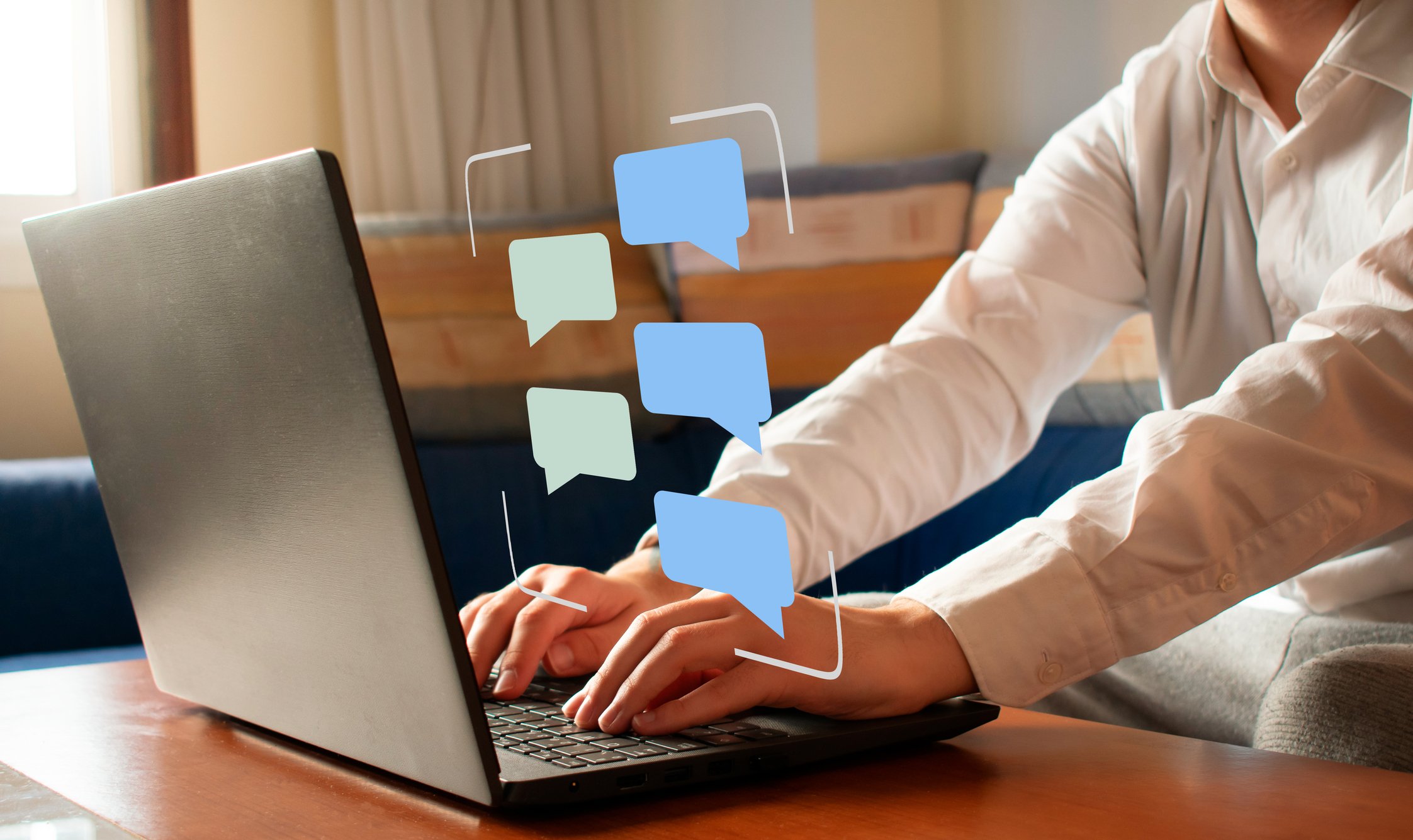 person communicating on laptop