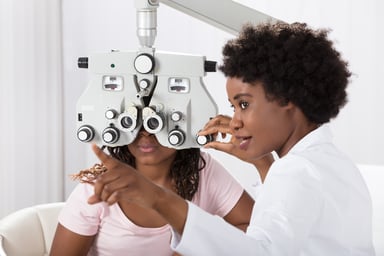 optometrist testing patients vision (1)