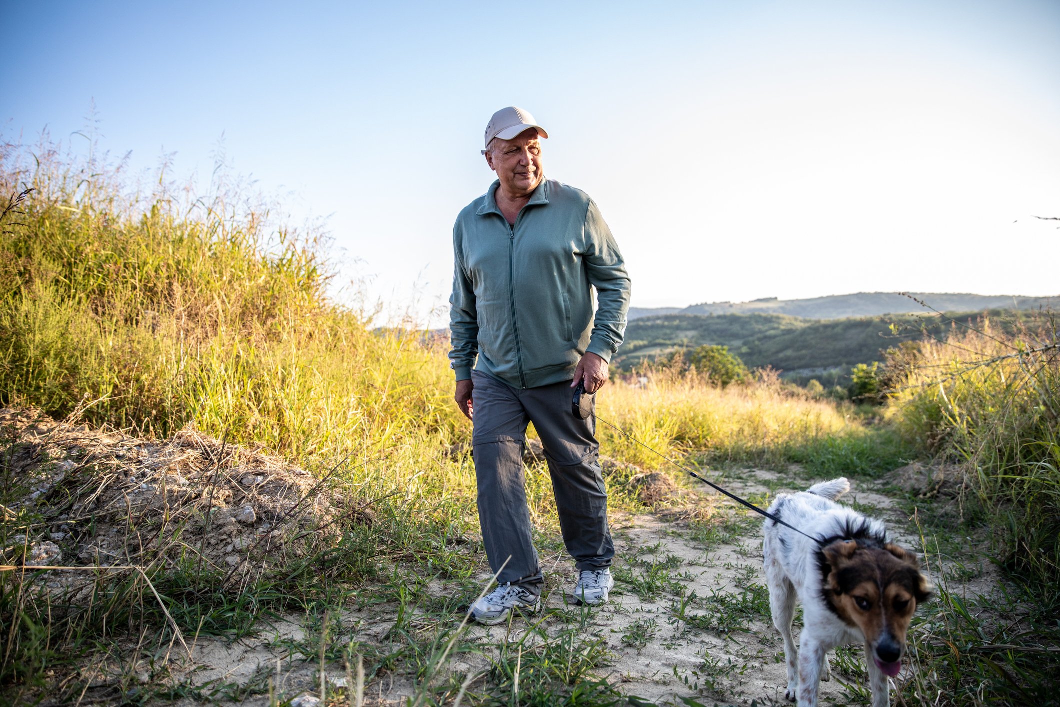 A person walking a dog.