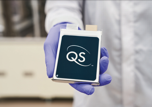 QuantumScape 24-layer battery cell in lab workers hand.