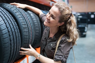 A customer shopping for tires.