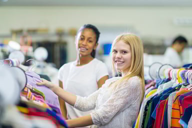 Young people shop for clothes.