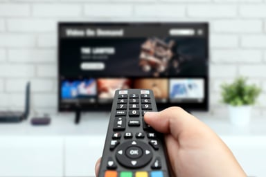 watching-streaming-tv-with-remote-control-in-hand