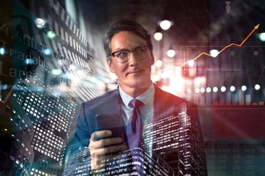 person-in-specs-holding-a-smartphone