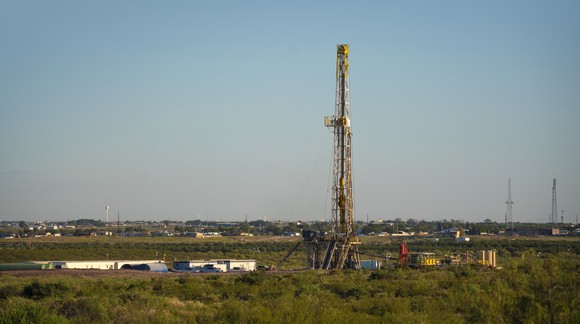 Fracking rig in a field. 