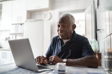 Senior man laptop GettyImages-1219569802