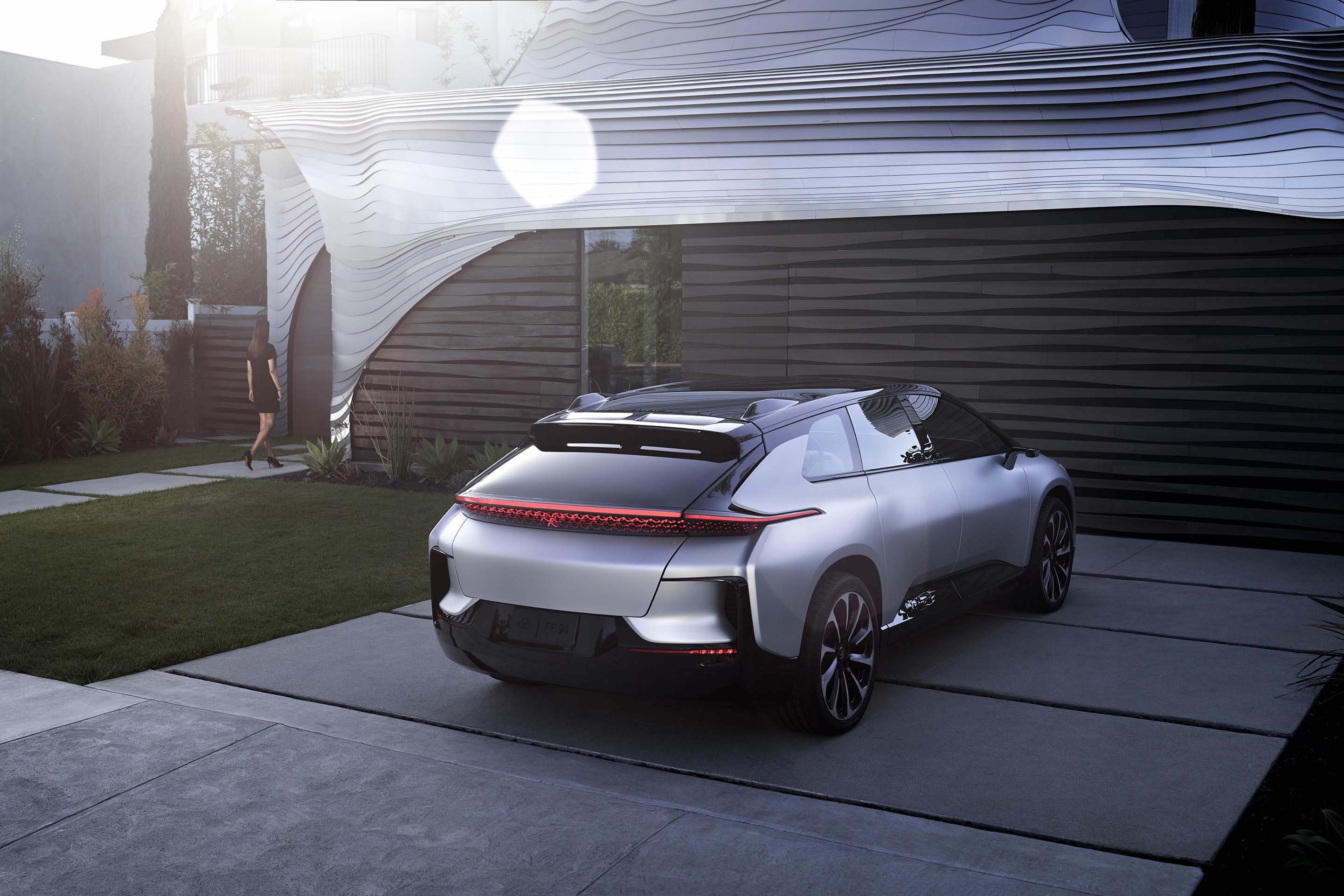 Faraday FF 91 ultra luxury EV in driveway.