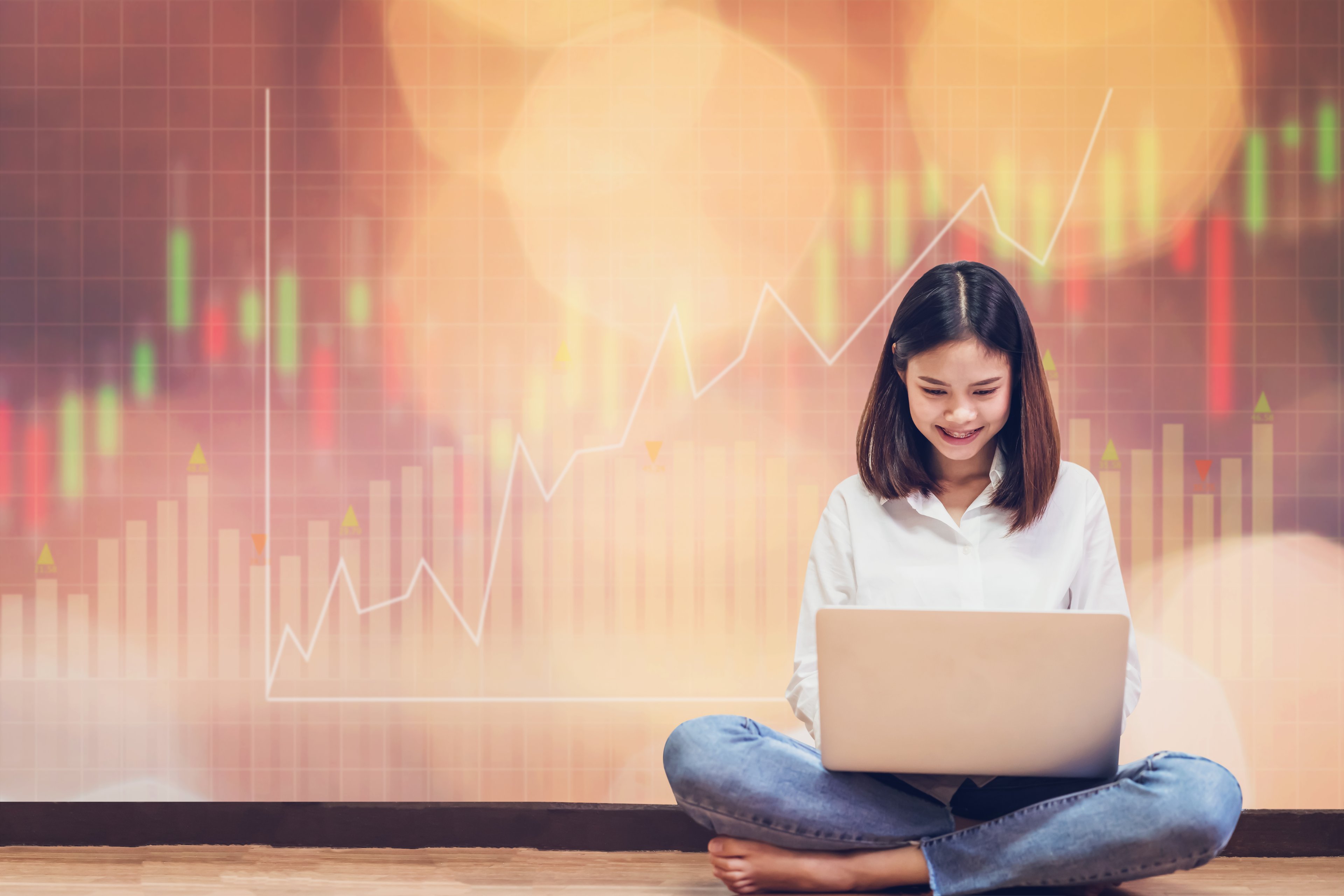 woman invests laptop online stocks broker
