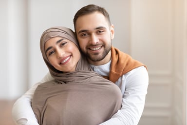 Getty - couple smiling embracing