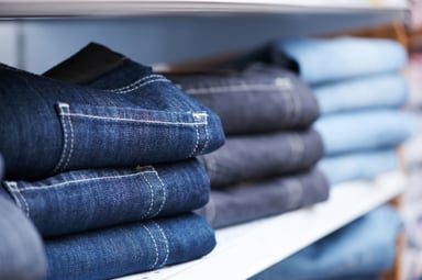 Jeans sitting-on-a-retail-store-shelf-denim getty