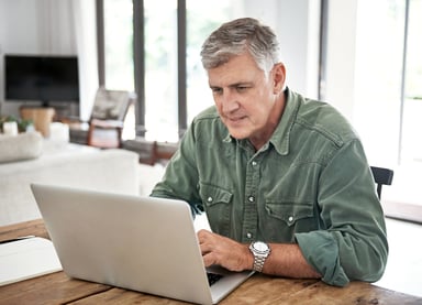 Older man 50s laptop