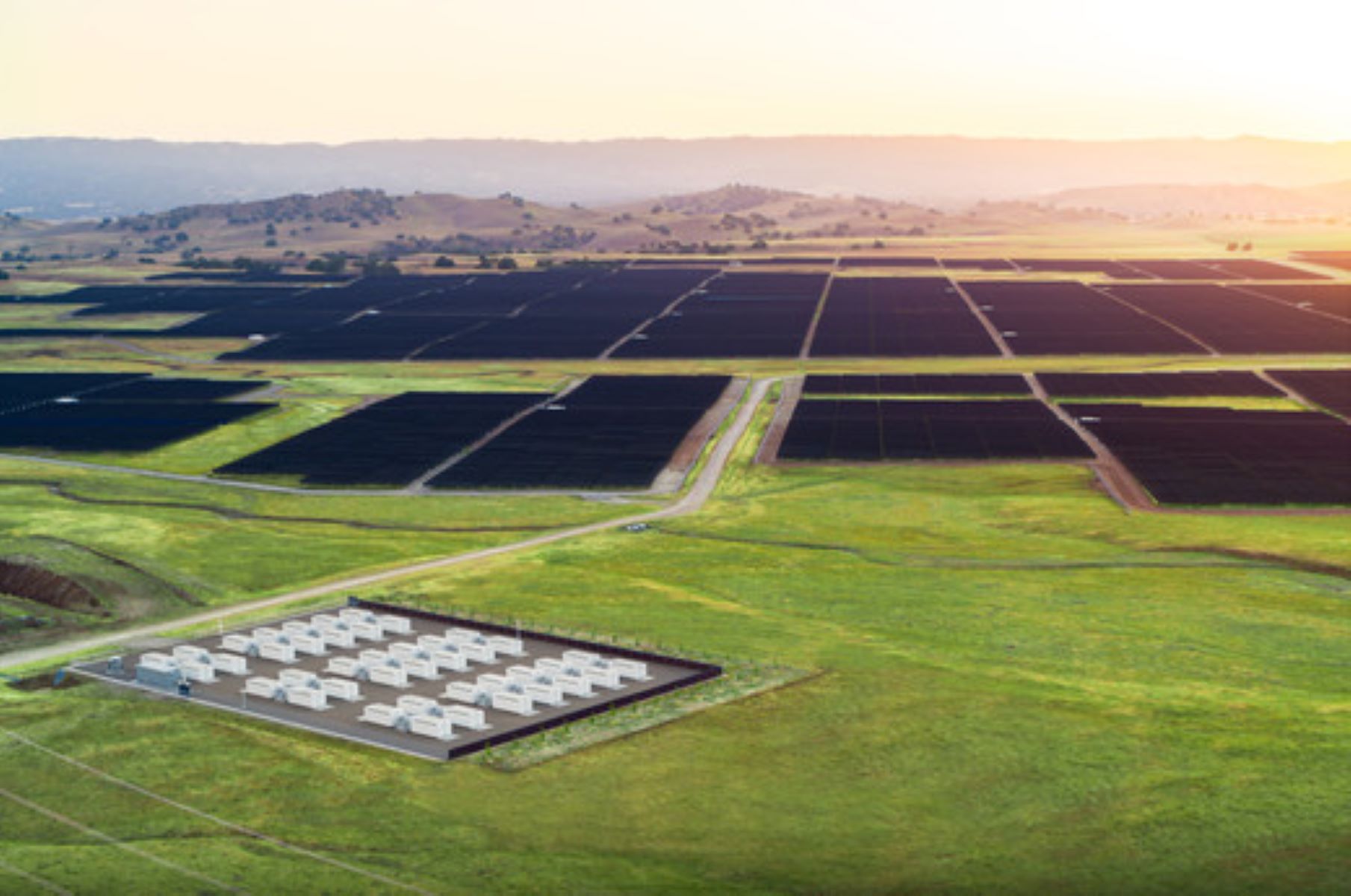 Tesla Megapacks in foreground, solar farm in background.