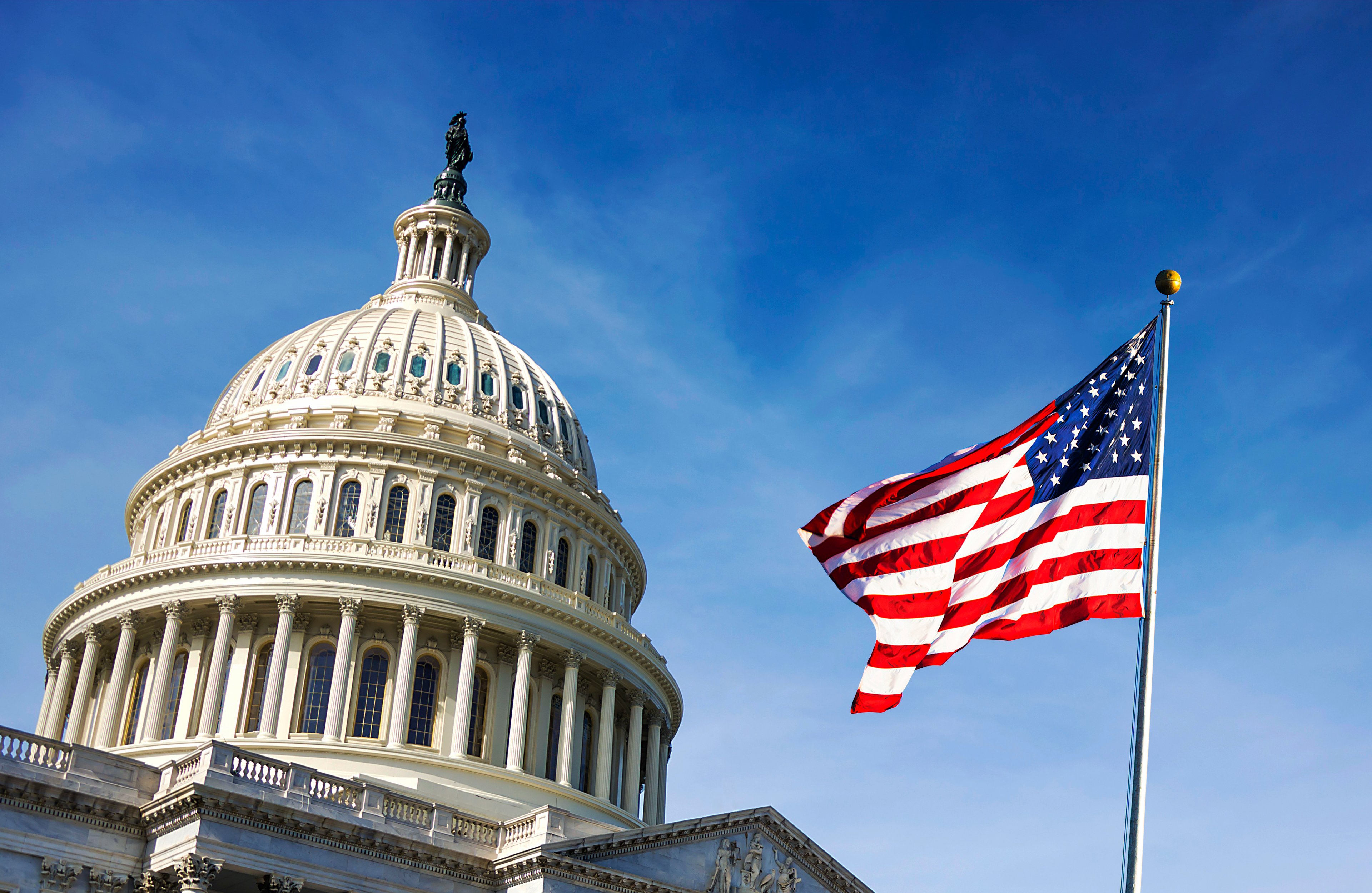 U.S. Capitol building with American flag.