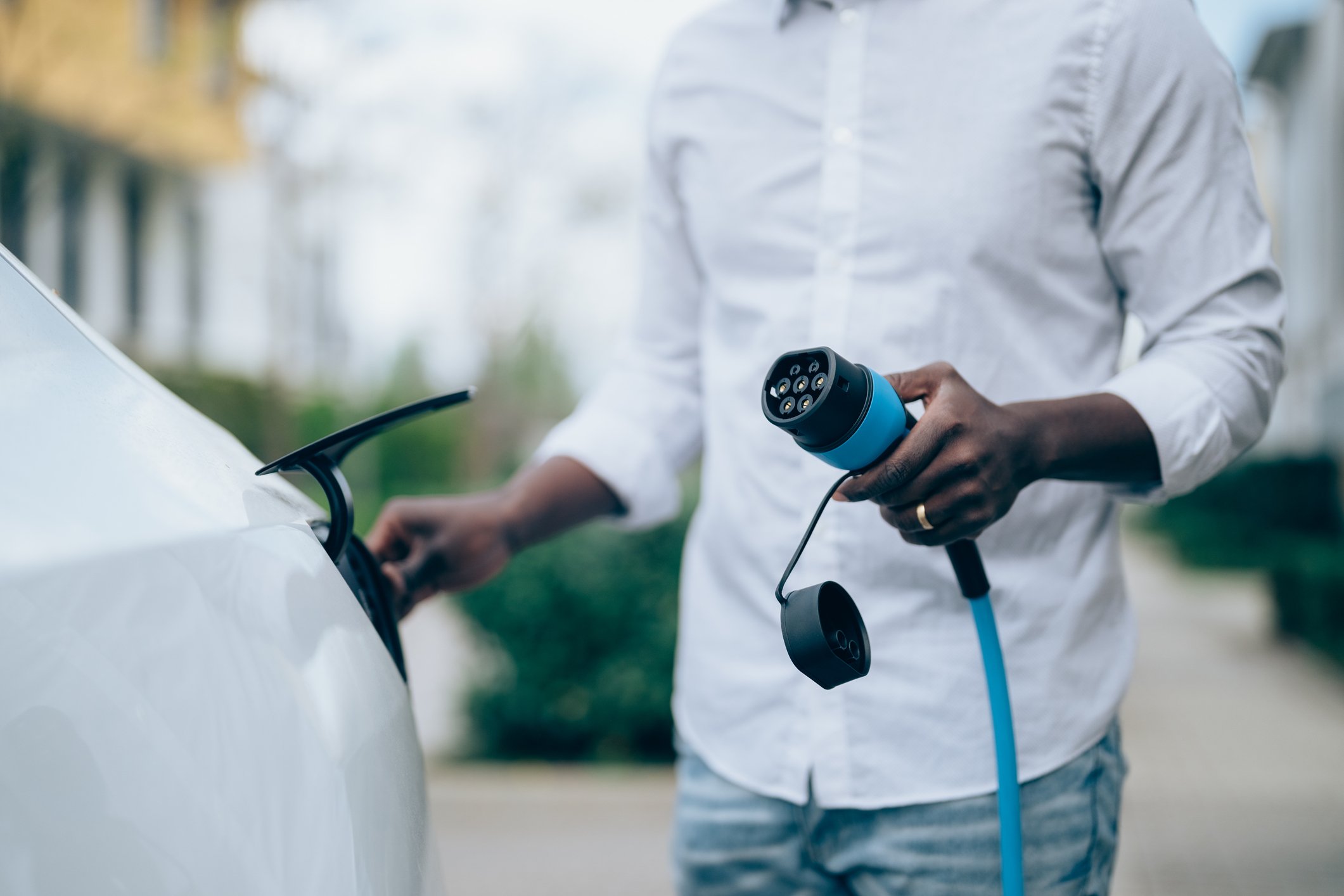 person with electric car