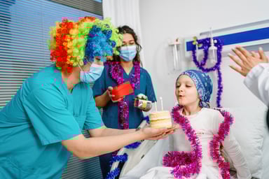 people celebrating birthday in a hospital
