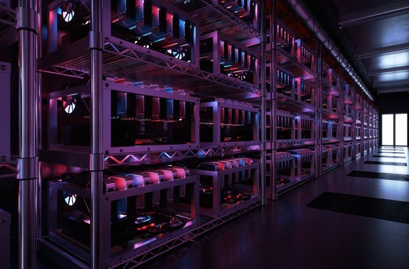 Cryptocurrency mining rigs in a data center.