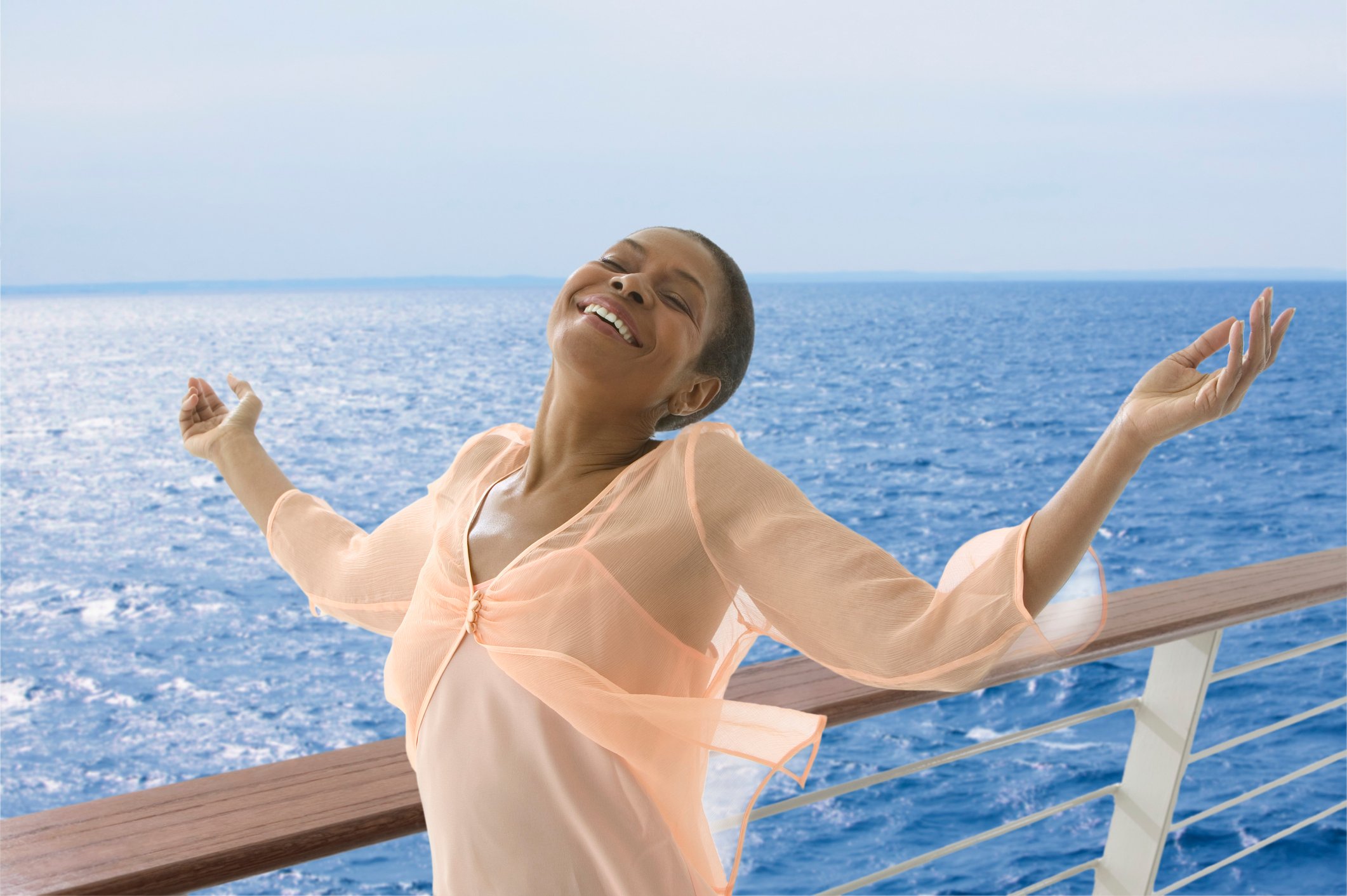 Cruise passenger enjoying the fresh ocean air.