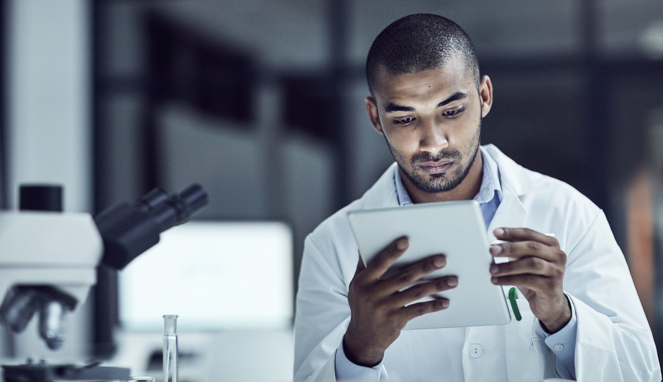 brilliant-scientist-with-tablet-getty