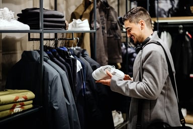 Person looking at sneakers in a store