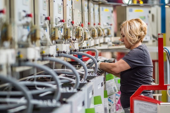 A factory worker on a production line. 