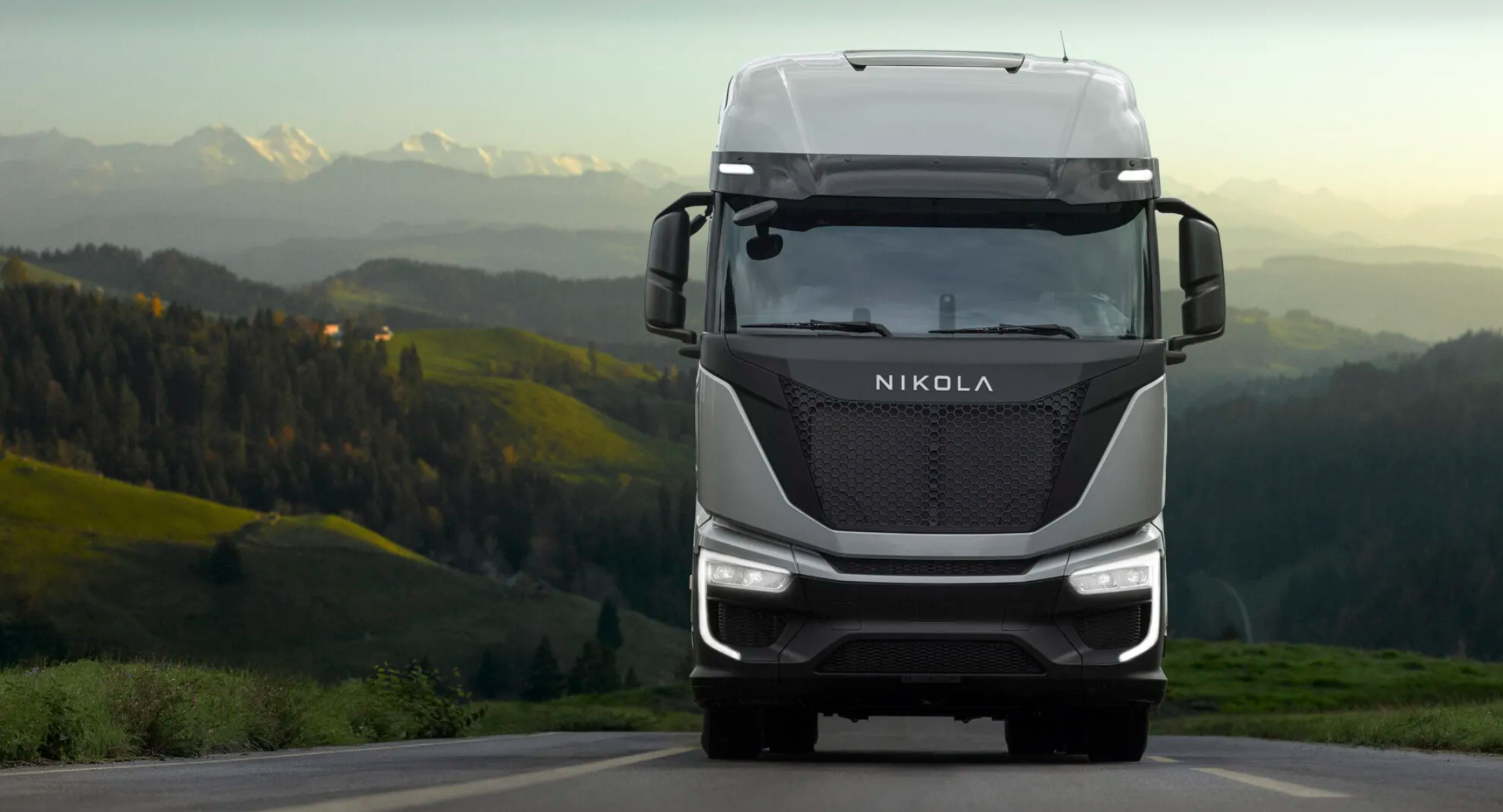 Nikola heavy truck on scenic road.
