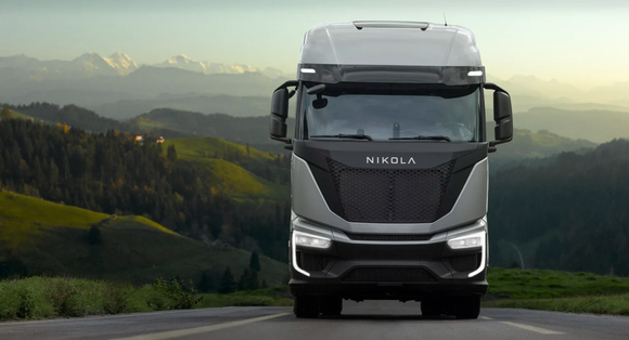Nikola heavy truck on scenic road.