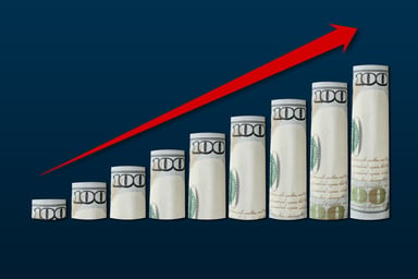 Dividend growth hundred dollar bills arrow up