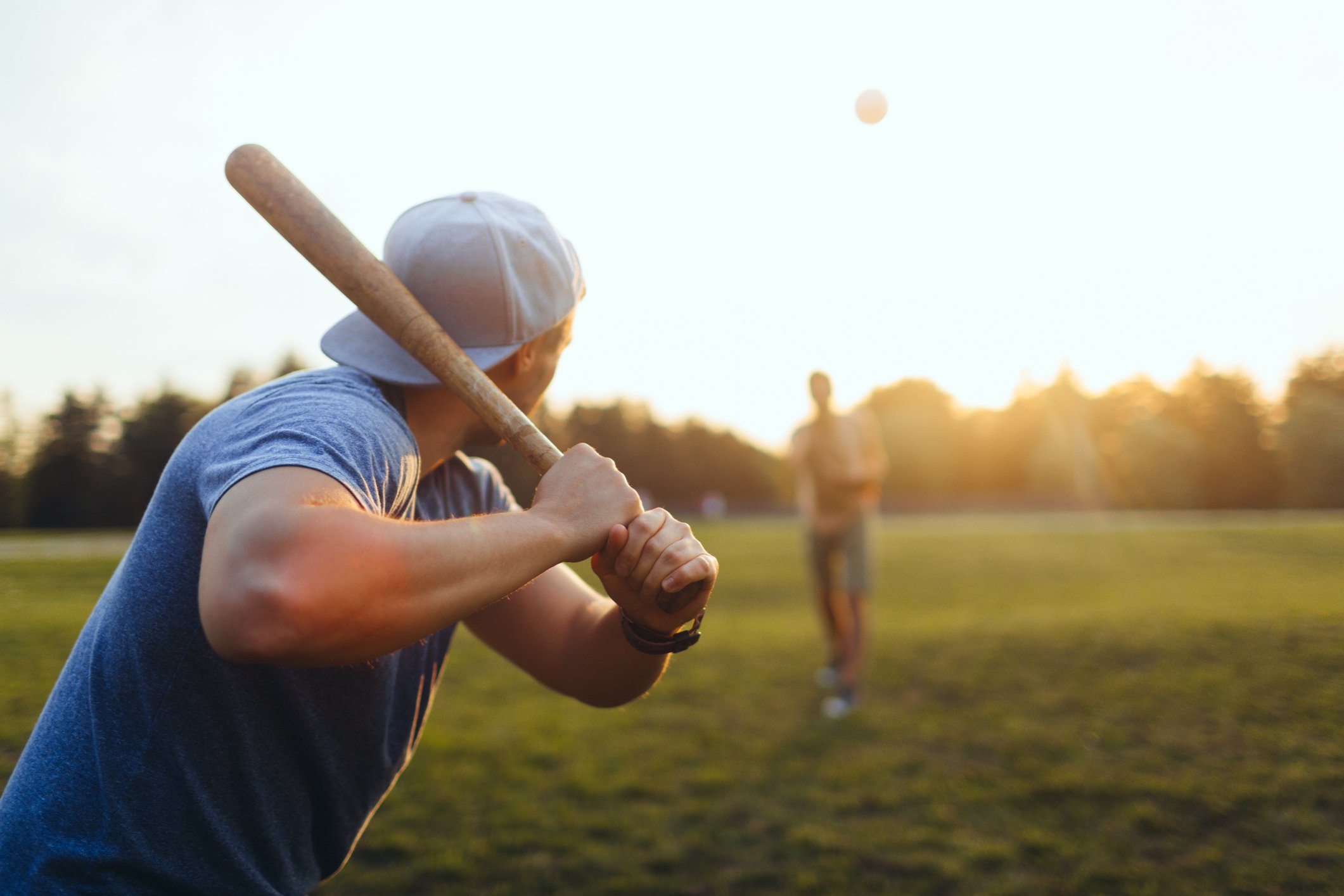 Baseball player concentrating on hitting the ball.