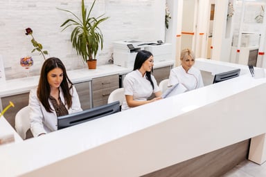 Receptionists at a hospital.
