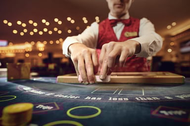 dealer at casino gaming table