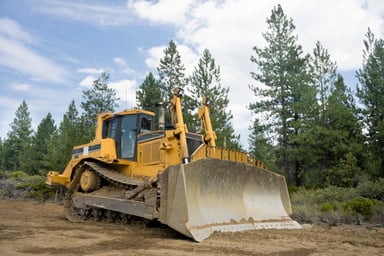 bulldozer-grating-forest-trees