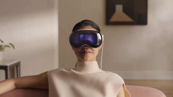 A person uses Apple's Vision Pro headset.
