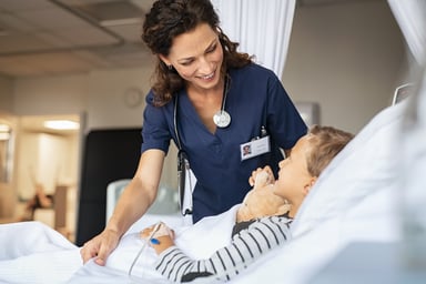 Young patient in hospital bed