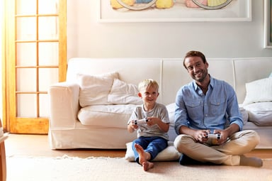 adult-and-child-playing-video-games