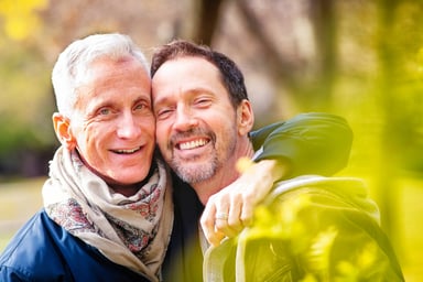 Getty - happy smiling couple lgbt gay outdoors