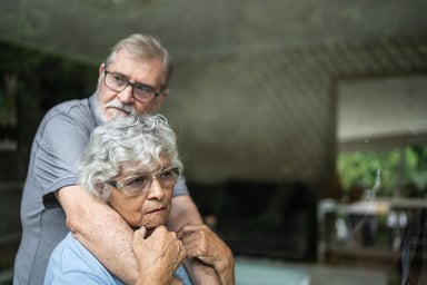 Elderly couple sad