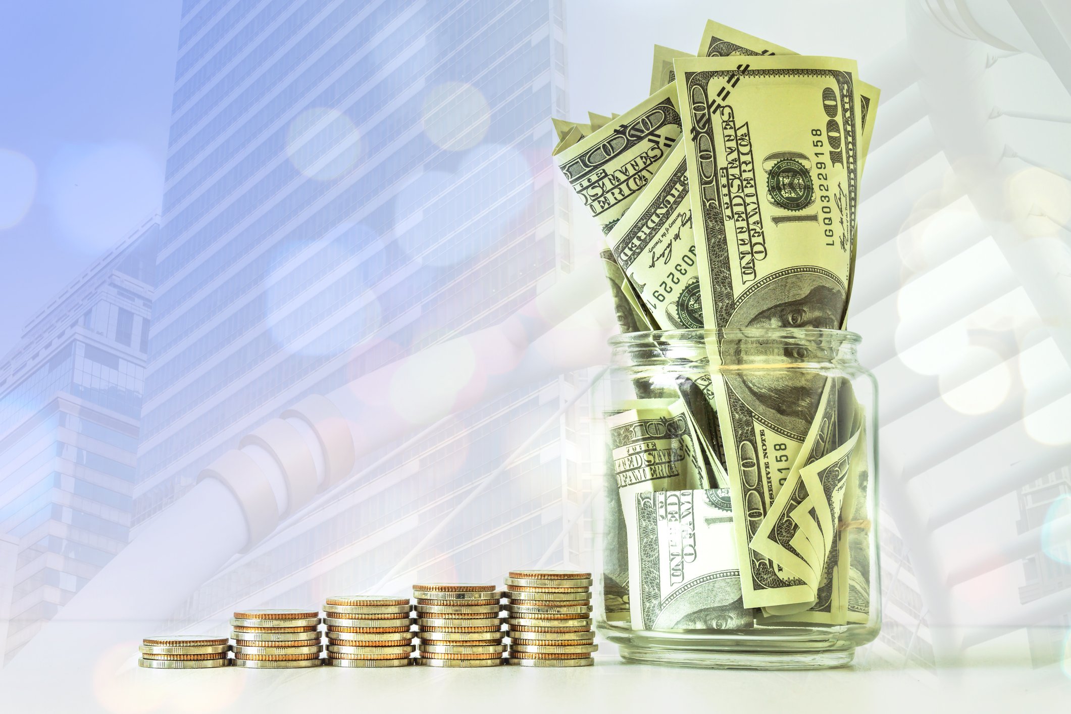 Stacks of coins growing over time.