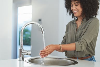 Faucet water woman