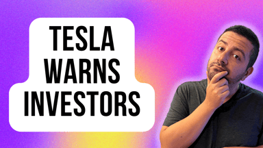 tesla warns investors