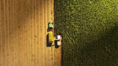 Deere tractor in field