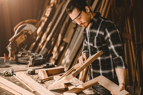 A person working in a wood shop.