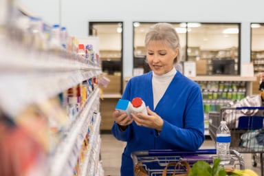 Woman looking at OTC meds
