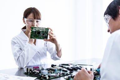 technicians working with integrated circuits