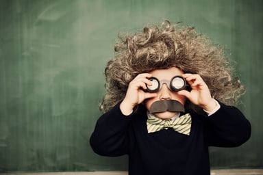 a child dresses up like Albert Einstein